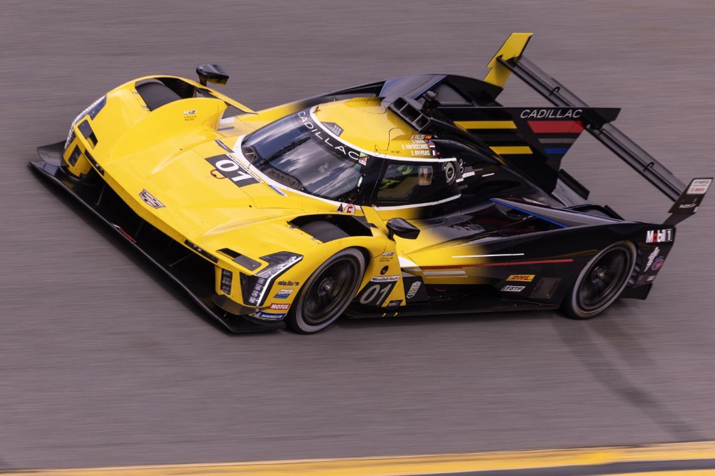 The number 01 yellow and black Cadillac V-Series.R GTP car with drivers Alex Palou, Renger van der Zande, and Sébastien Bourdais at Daytona in the 2024 IMSA season.